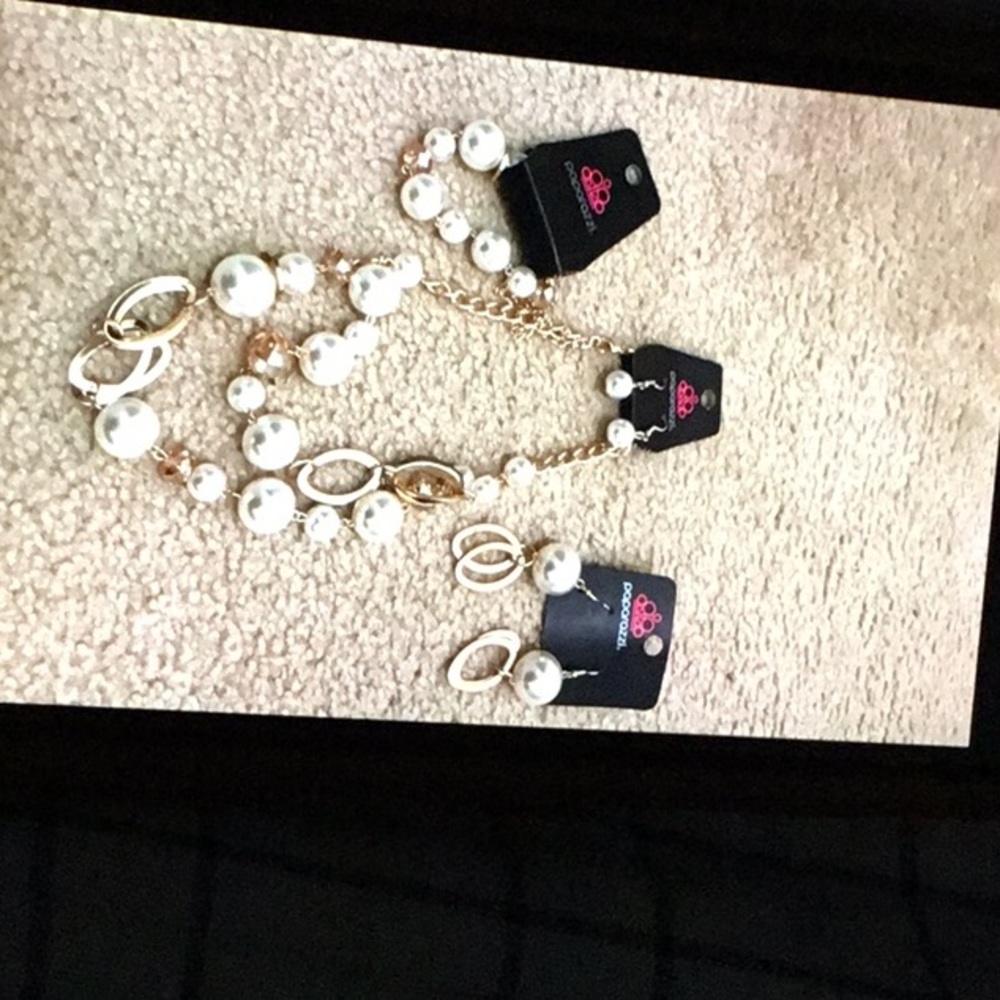 Woman necklaces earrings bracelets